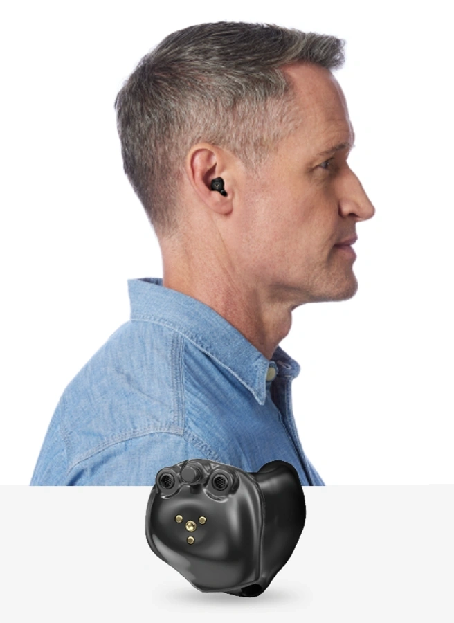 Side profile of a man wearing In-the-Canal (ITC) Hearing Aids, nearly invisible hearing aids